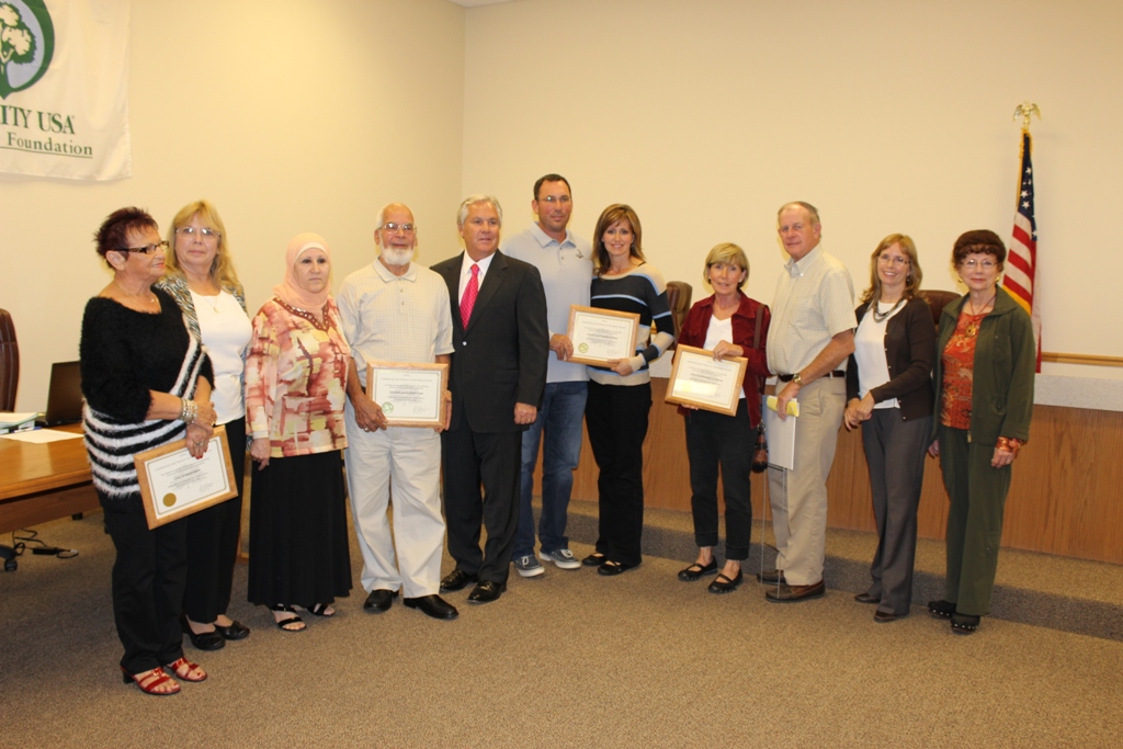Group Photo With People Holding Awards
